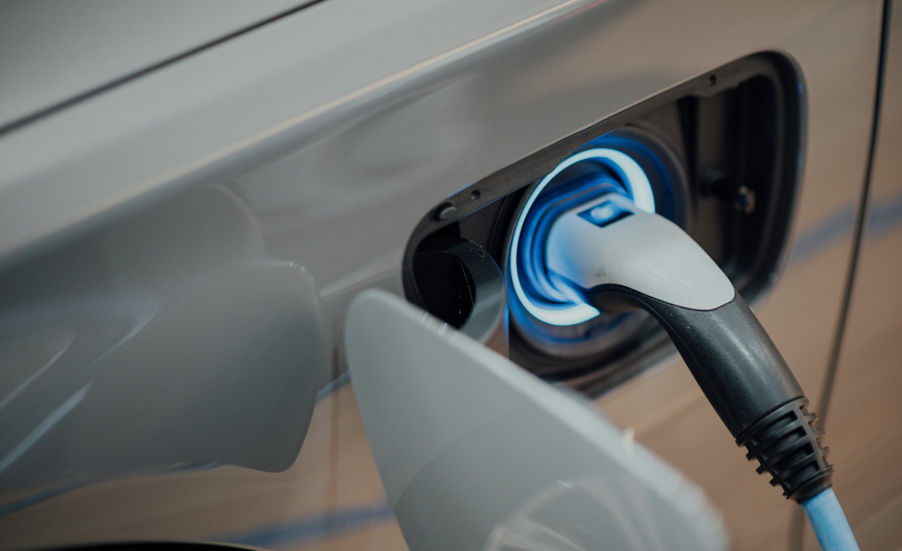 Charging cable plugged into an electric vehicle