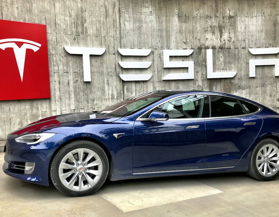 Electric car parked by a charging station